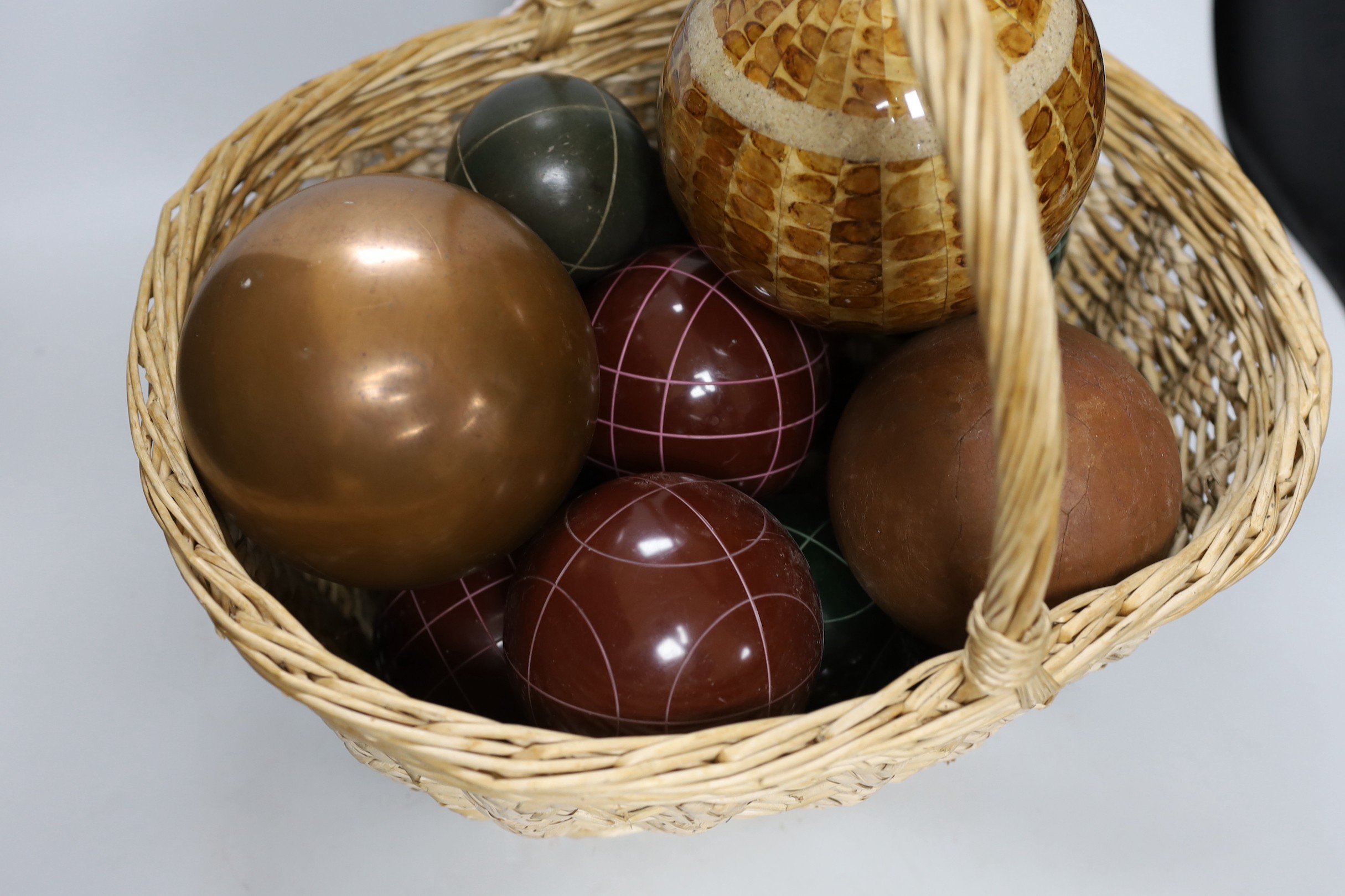 A basket of decorative varying sized balls